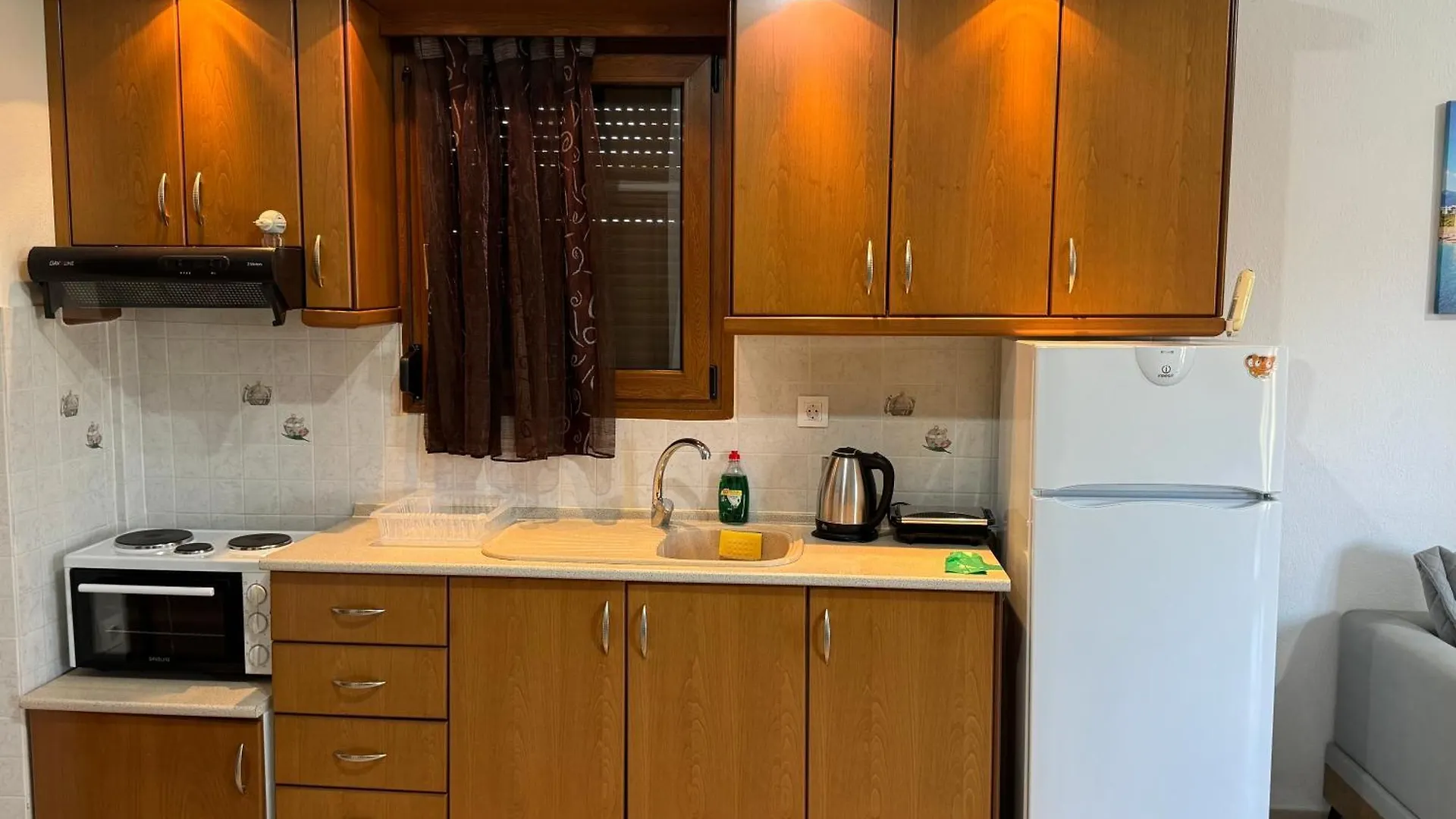 Caryatis Ntoridis Studios & Apartments In Afitos Greece